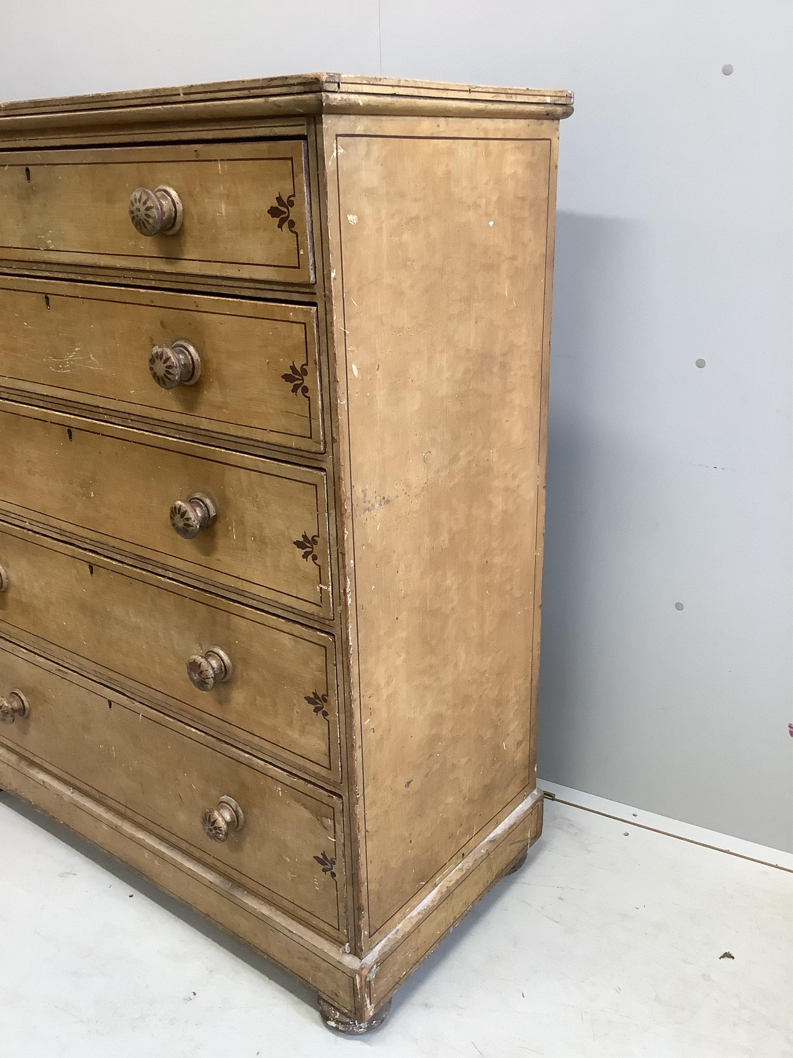 An early 19th century pine five drawer chest with original painted decoration, width 109cm, depth 51cm, height 129cm. Condition - fair